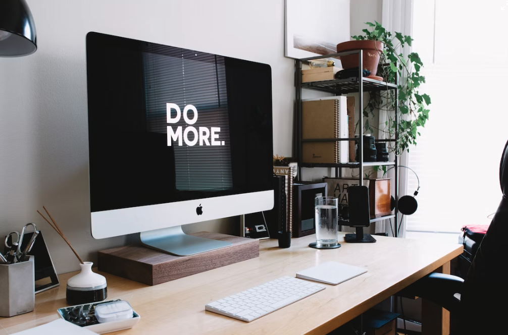 What is CSR? Image of a computer monitor, with white text which reads "Do More" on a black background.